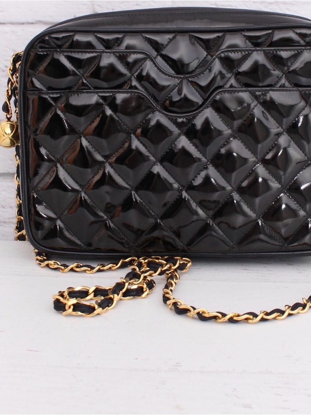 CHANEL Black Quilted Patent Crossbody with Gold Chain